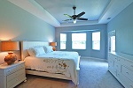 Master bedroom tray ceiling and charming bay window